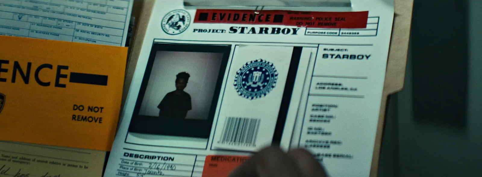 a person is looking at a fake starboy id card