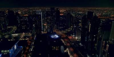 an aerial view of a city at night