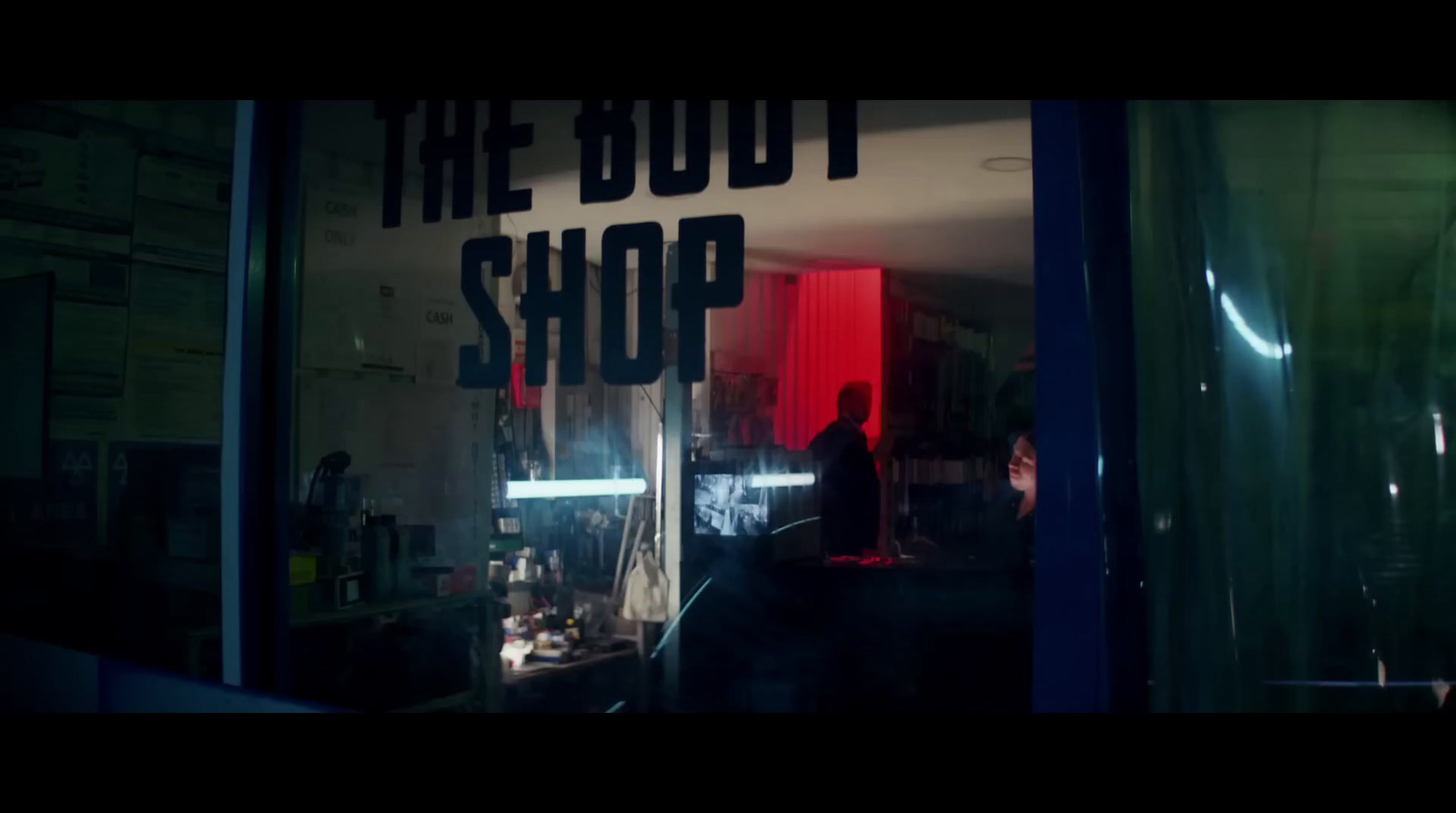 a shop window with a sign that says the boot shop