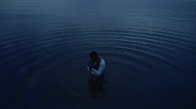 a person standing in a body of water