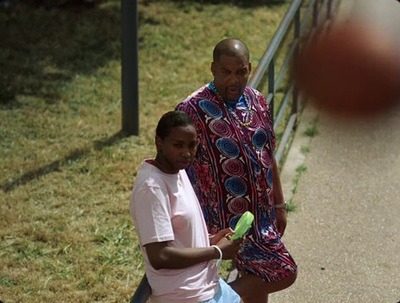 a man and a woman standing next to each other