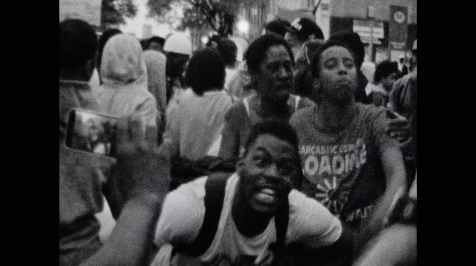 a black and white photo of a group of people