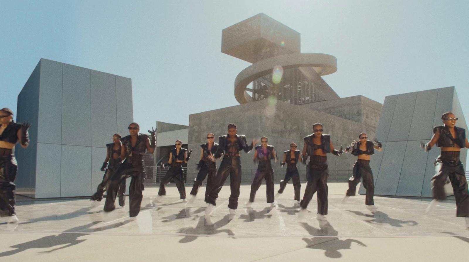 a group of men standing in front of a building