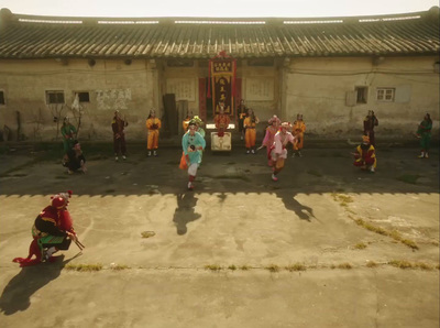 a group of people standing in front of a building