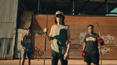 a group of young men standing next to each other