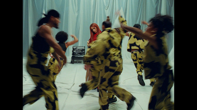 a group of people dancing in a room