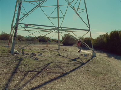 a person is running on a dirt road