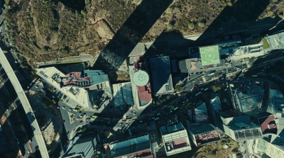 an aerial view of a city street and buildings