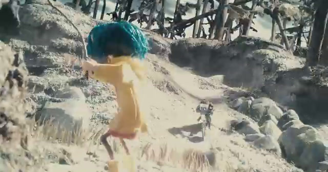 a girl with blue hair walking up a hill