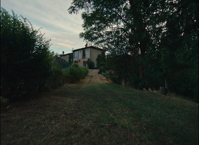 a house in the middle of a wooded area