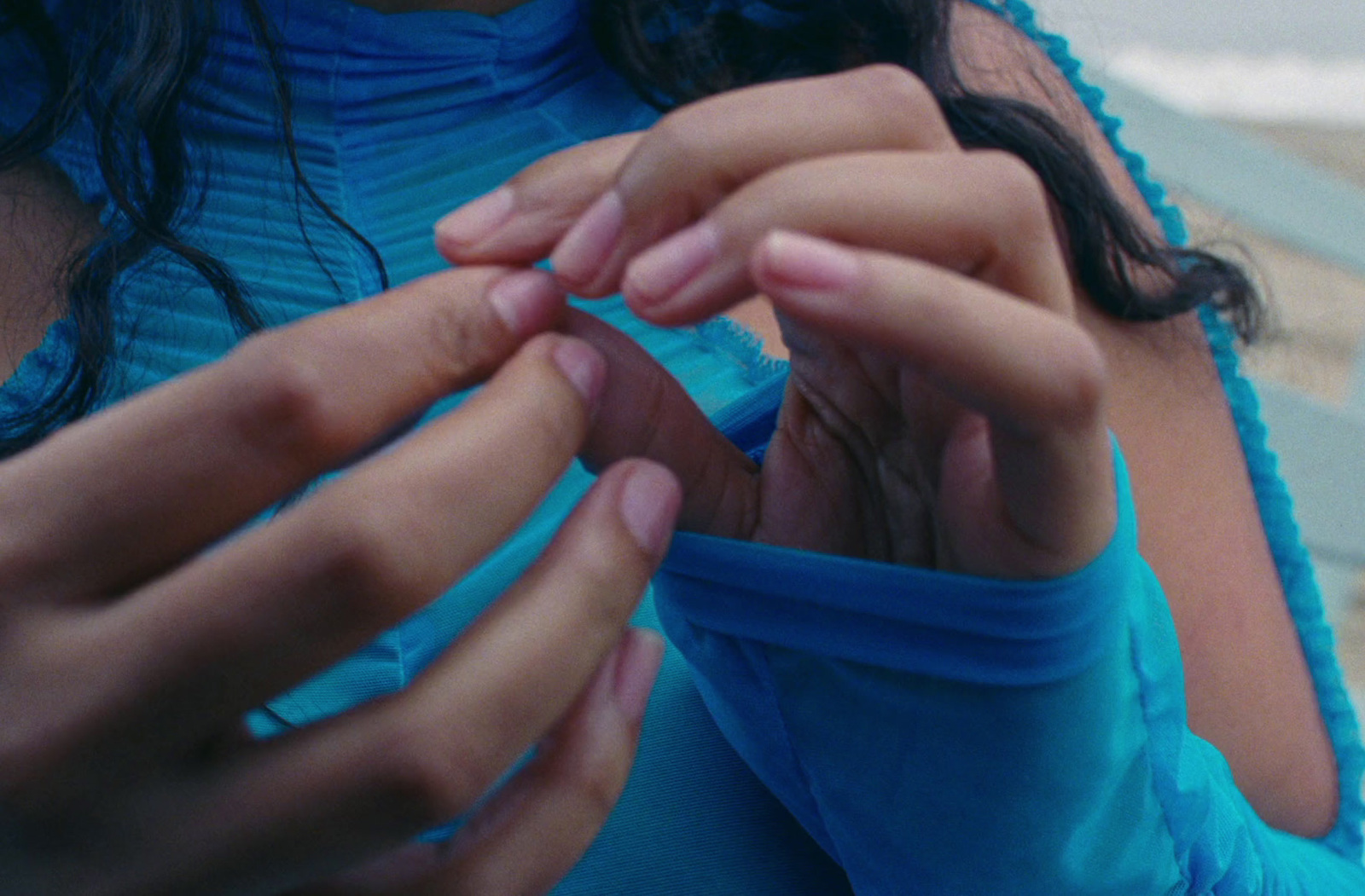 a close up of a person holding something in their hands