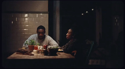 a man and a woman sitting at a table