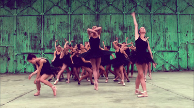 a group of young ballerinas in a dance pose