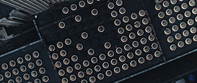 a close up of a metal structure with holes