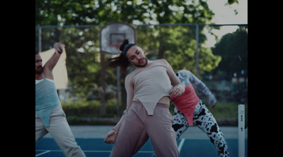 a group of people playing a game of tennis