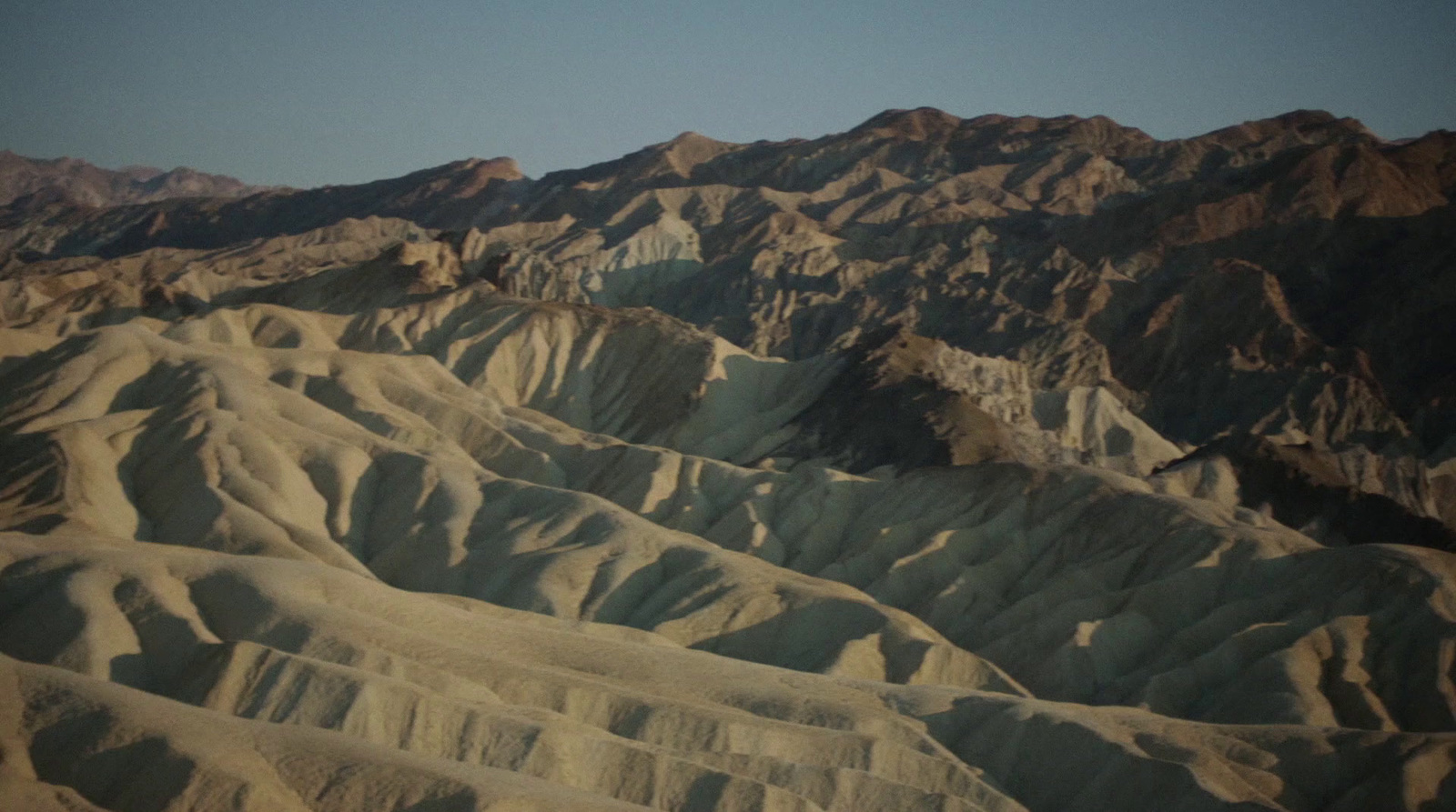 a view of a mountain range from an airplane