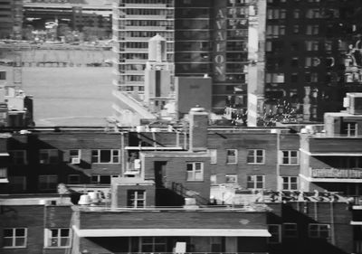 a black and white photo of buildings in a city