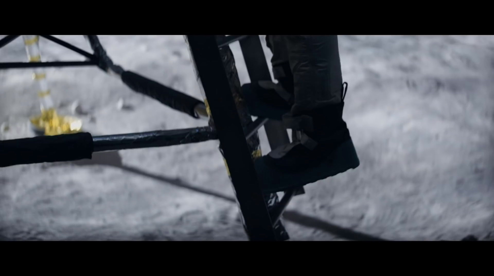 a close up of a metal object on a snowy surface