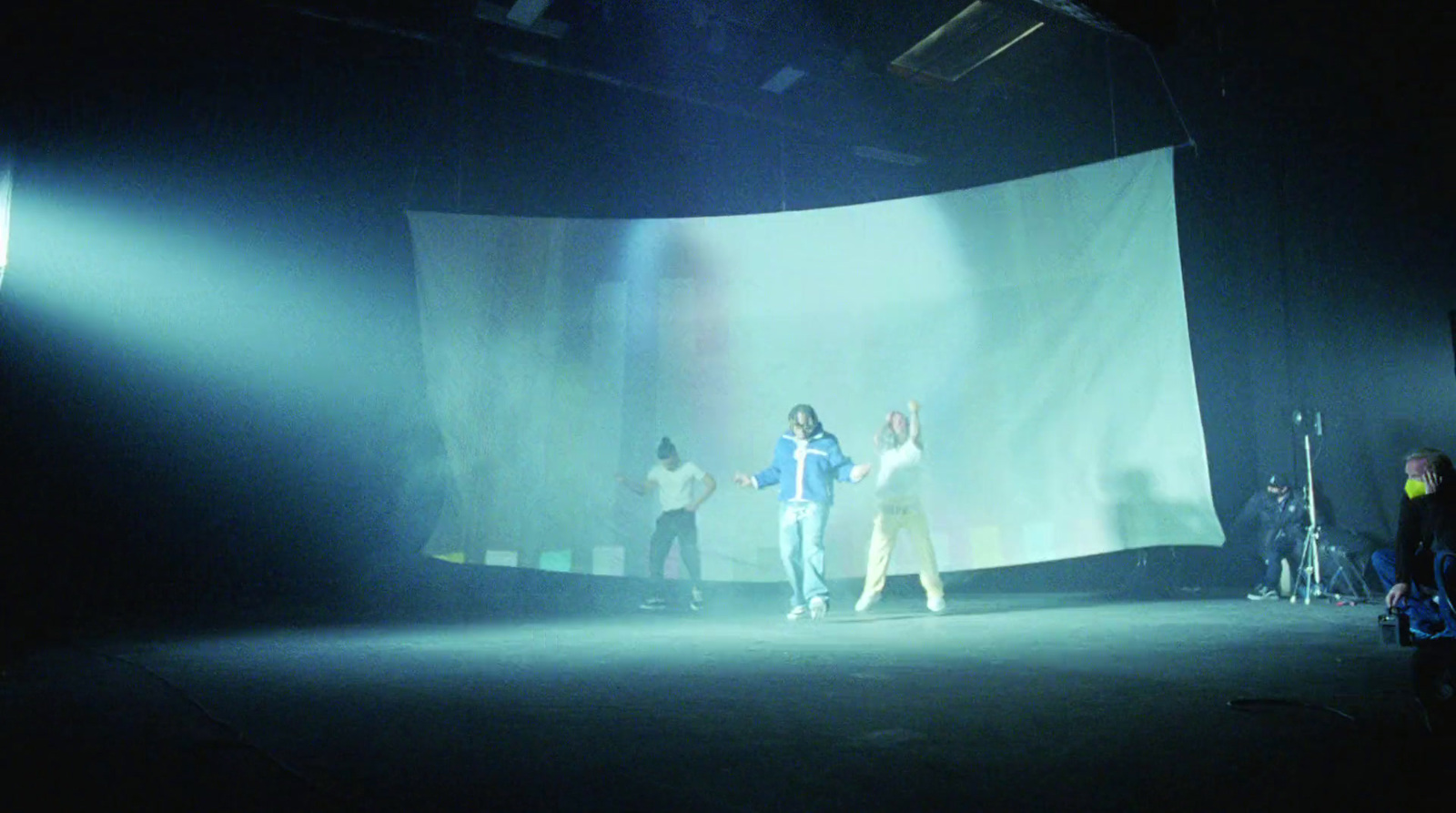 a group of people standing on top of a stage