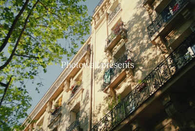 a tall building with balconies and balconies on the balconies