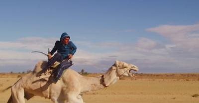 a man riding on the back of a white horse