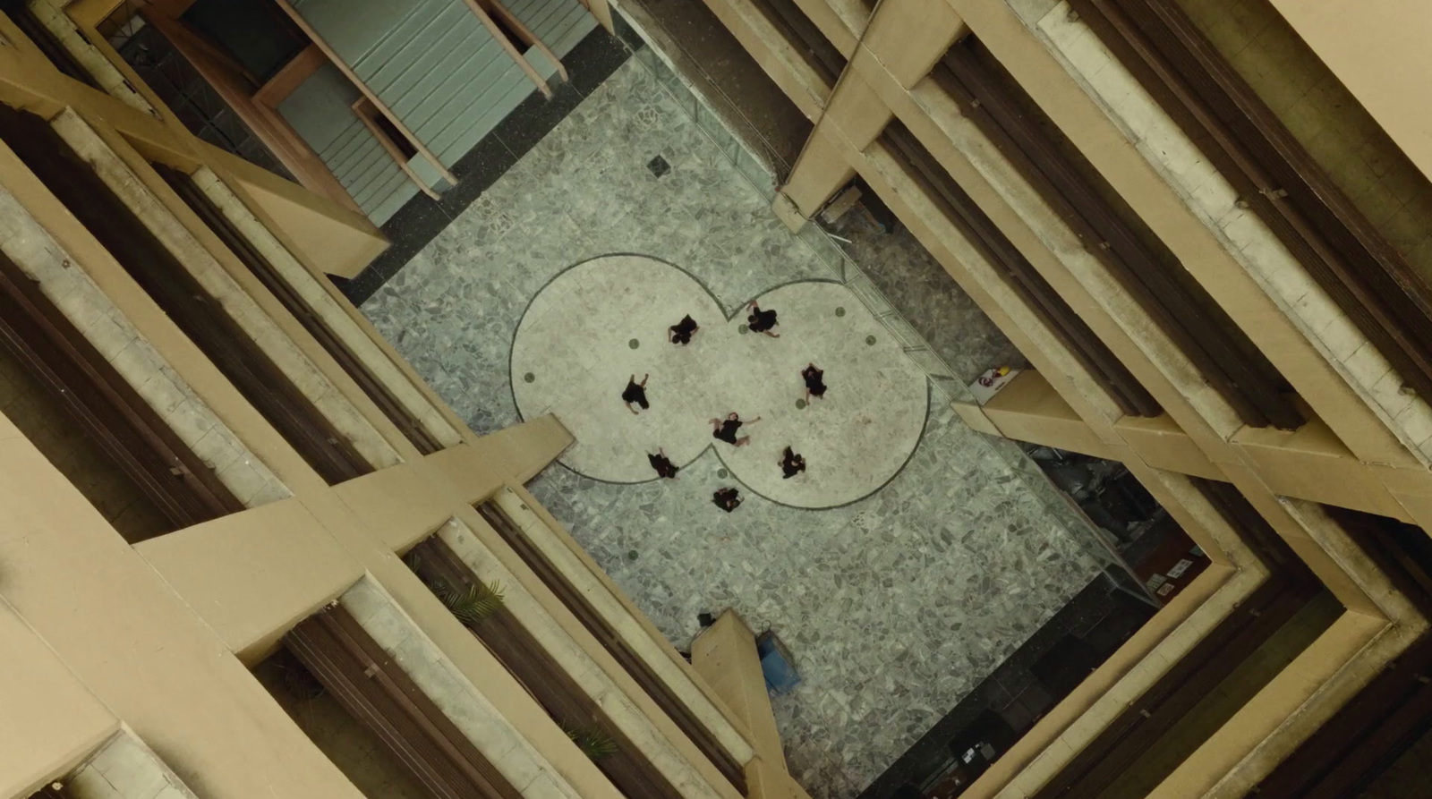 an overhead view of a building with a bunch of bugs on the floor