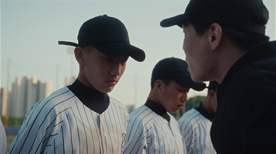 a group of baseball players standing next to each other