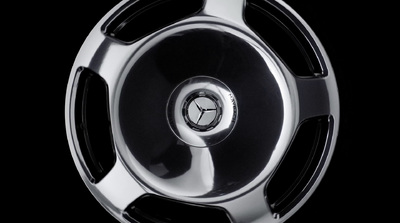 a close up of a wheel on a black background