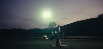 a traffic light sitting on the side of a road