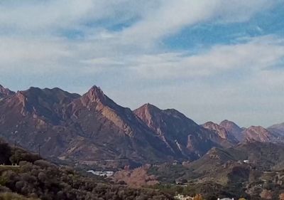 a view of a mountain range from a distance