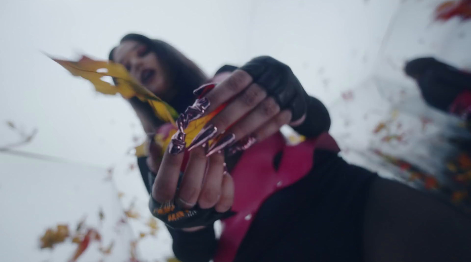 a woman holding a candy bar in her hands