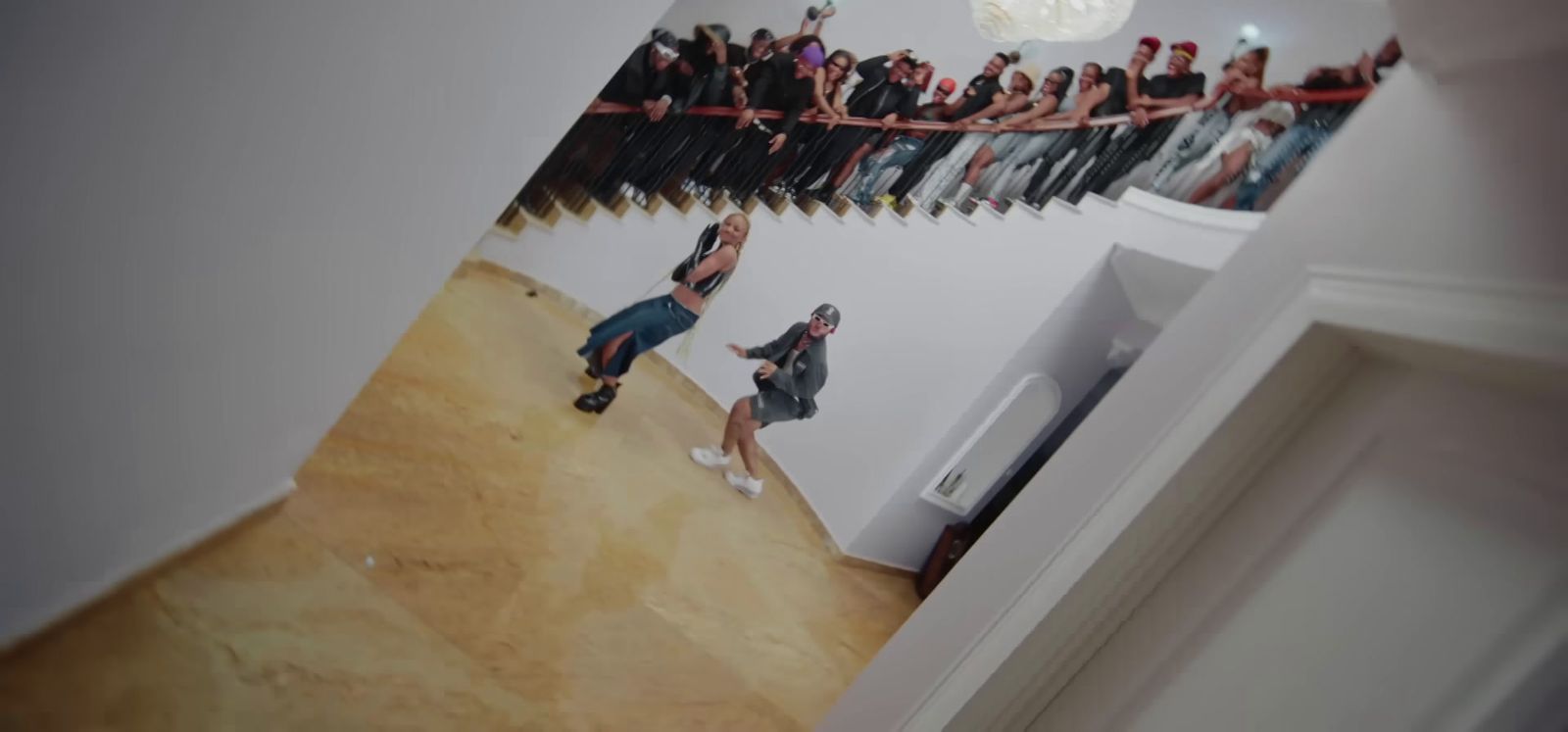 a group of people standing in a room