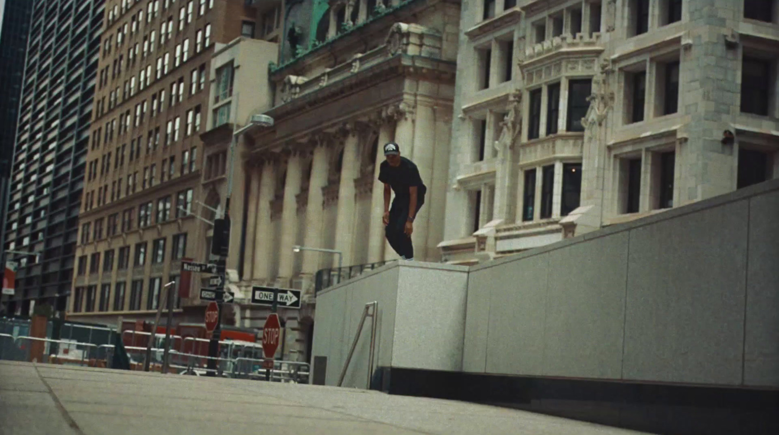 a man riding a skateboard down the side of a ramp