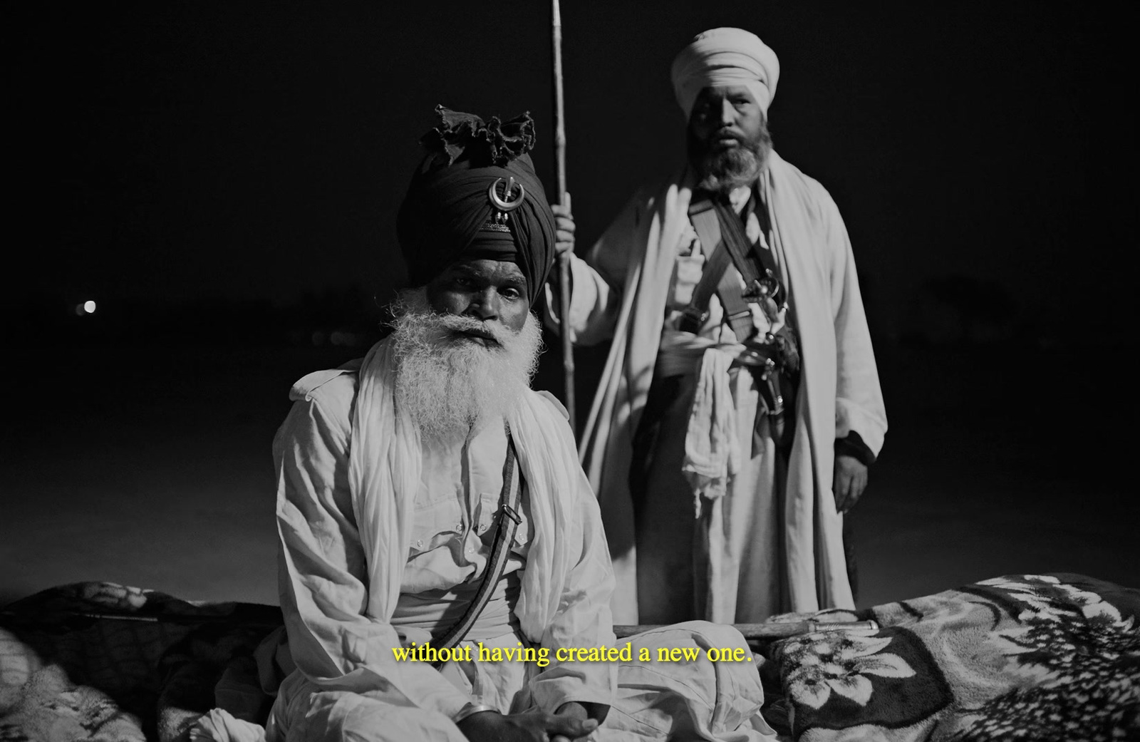 a black and white photo of two men