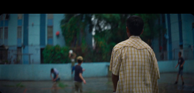 a group of people playing a game of frisbee