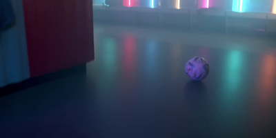 a ball sitting on the floor in a room