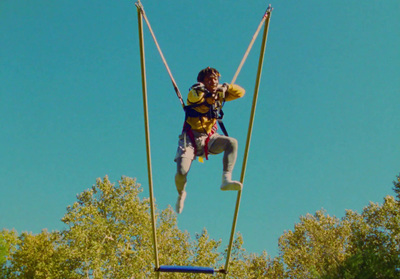 a man on a high jump in the air