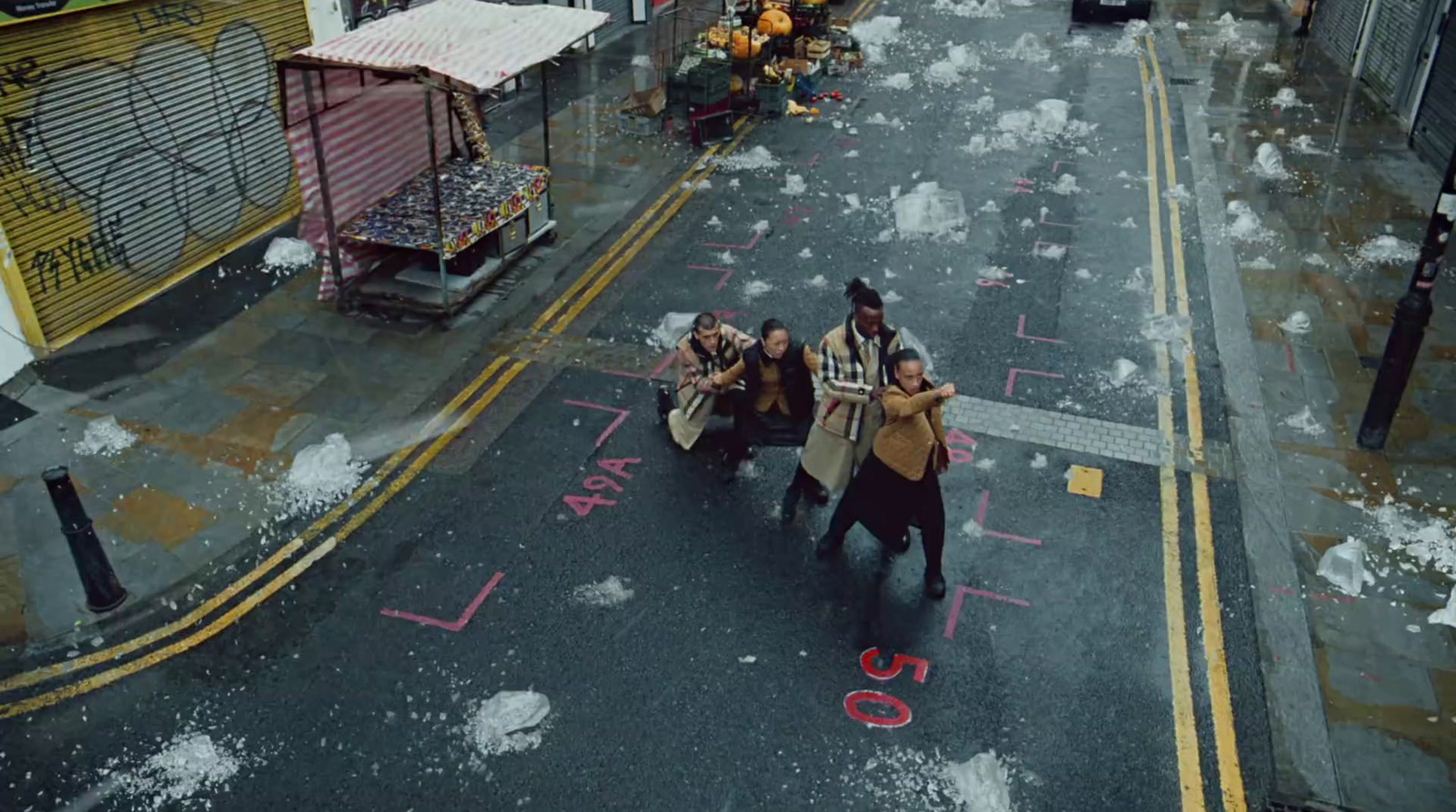 a group of people walking down a street