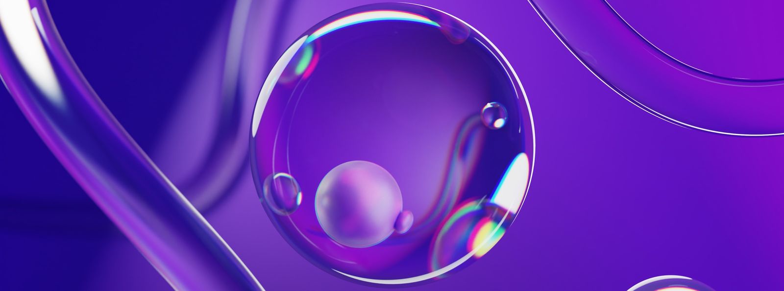 a close up of a liquid droplet on a purple background