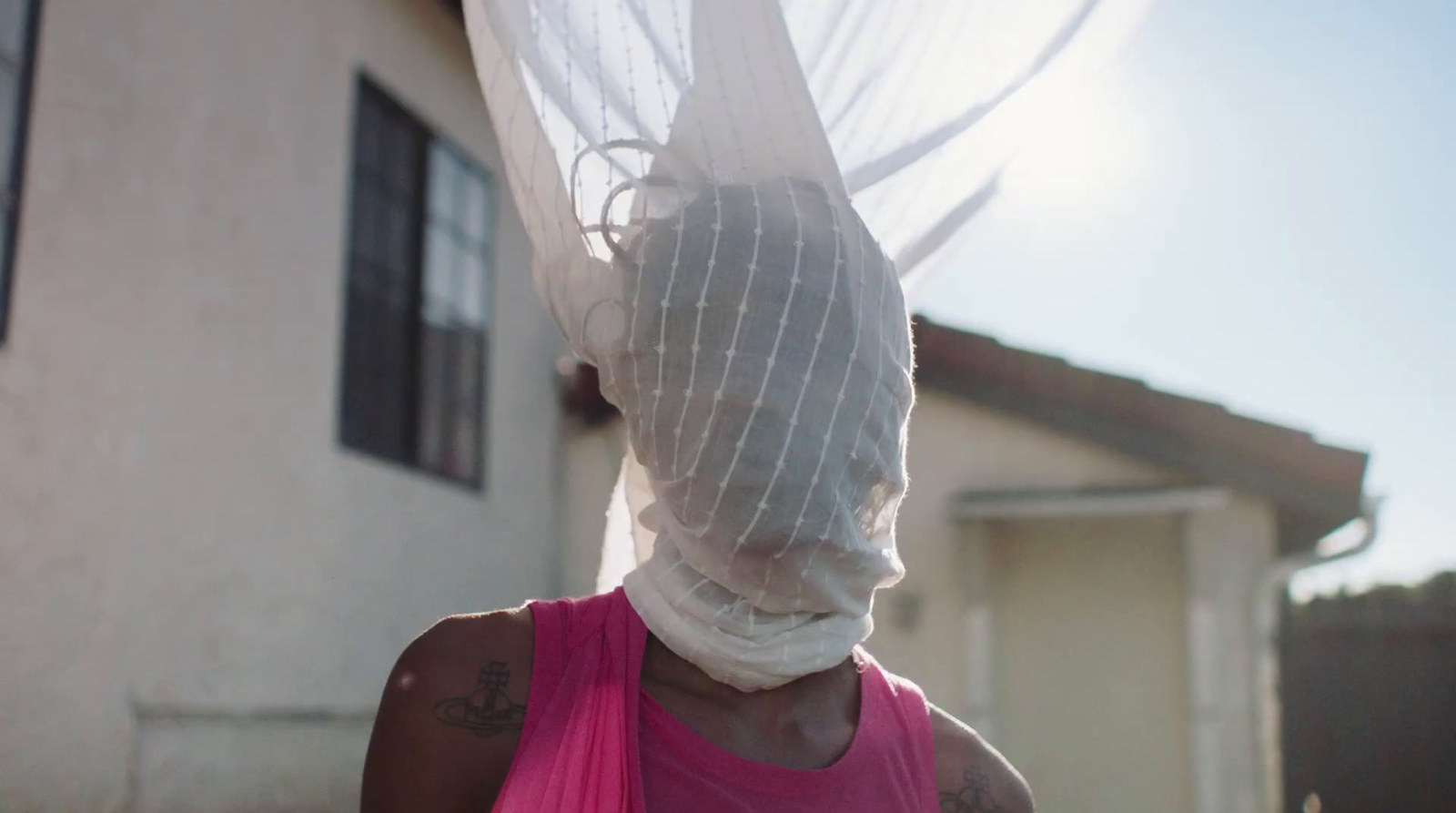 a woman with a veil over her head