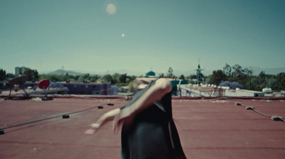 a person standing on top of a roof