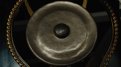 a gong sitting on top of a wooden table