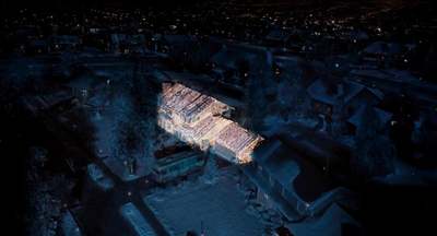 an aerial view of a building at night