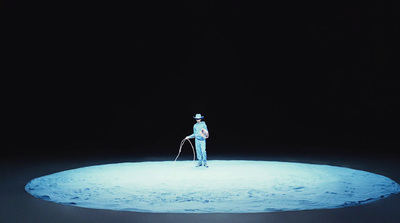 a man standing on top of a snow covered ground