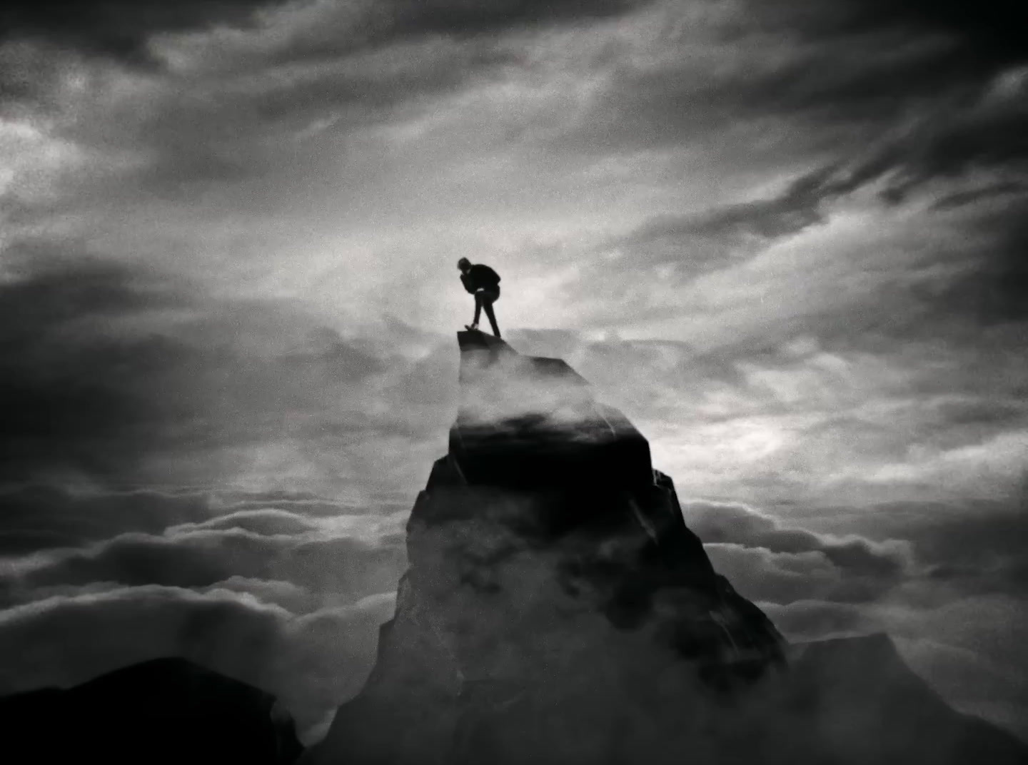 a person standing on top of a mountain