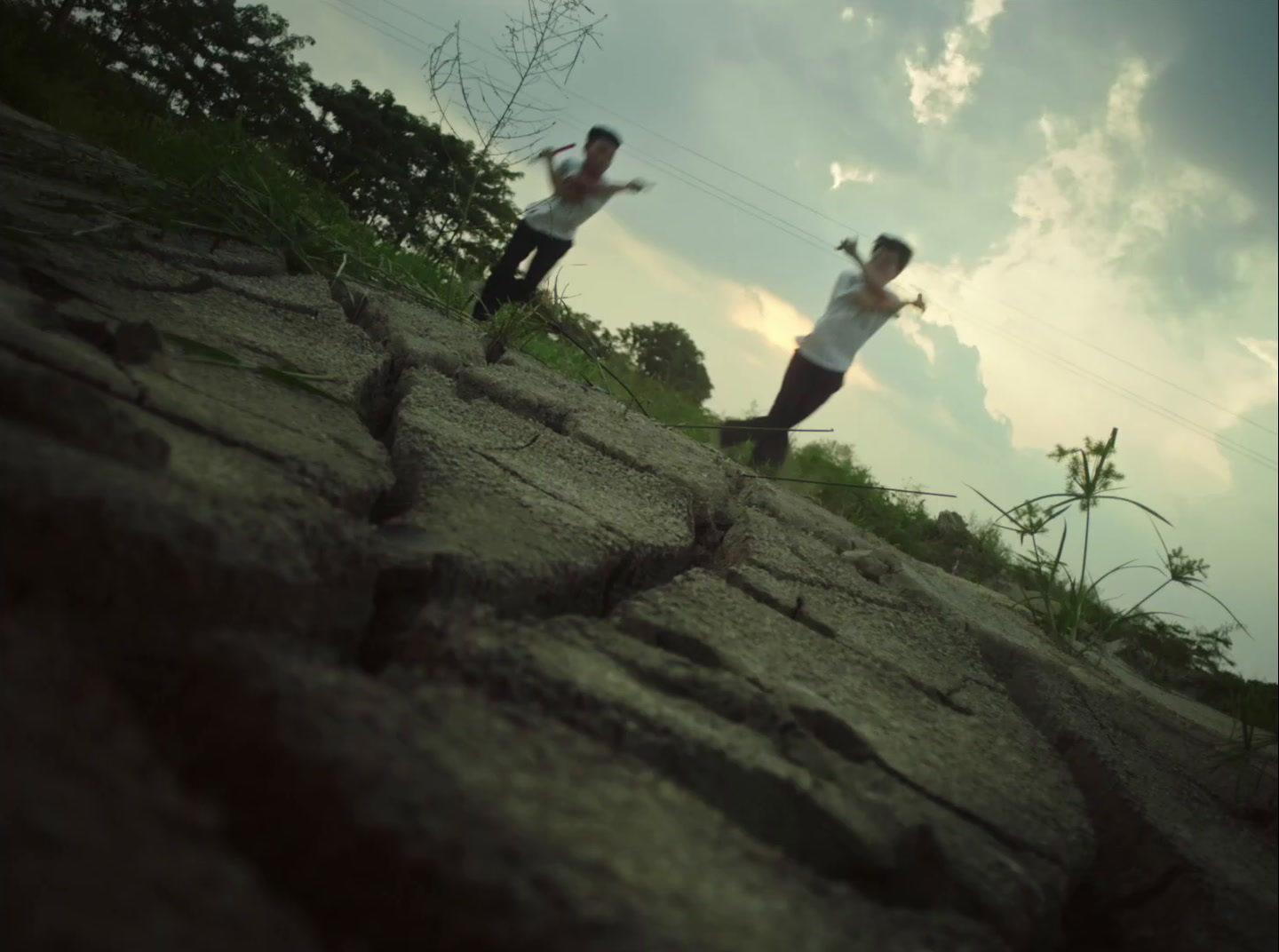 a couple of people that are standing on some rocks