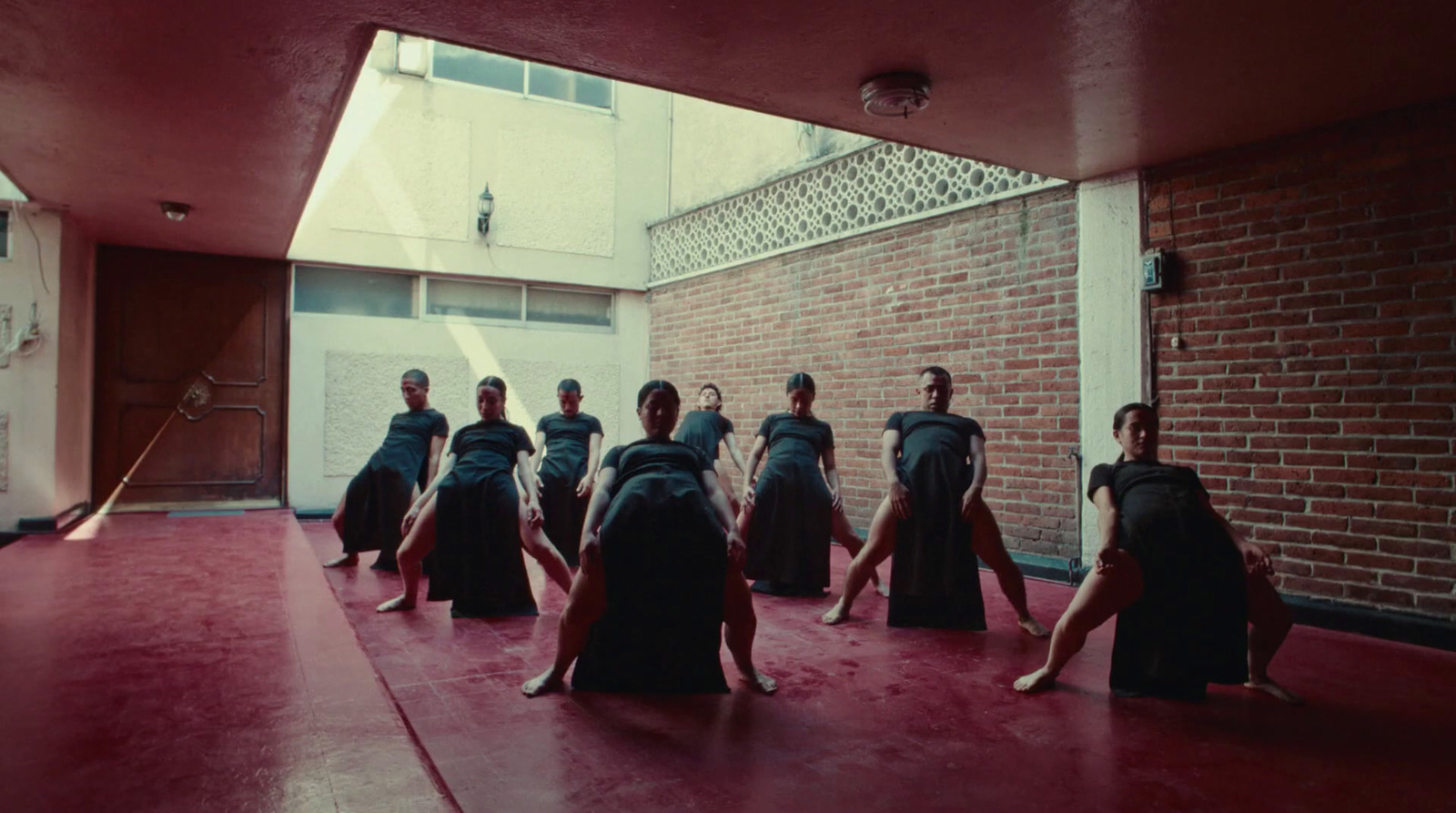 a group of people standing in a room