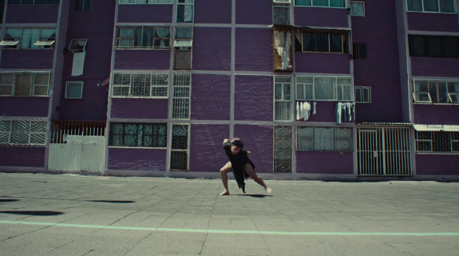 a person on a skateboard in front of a building