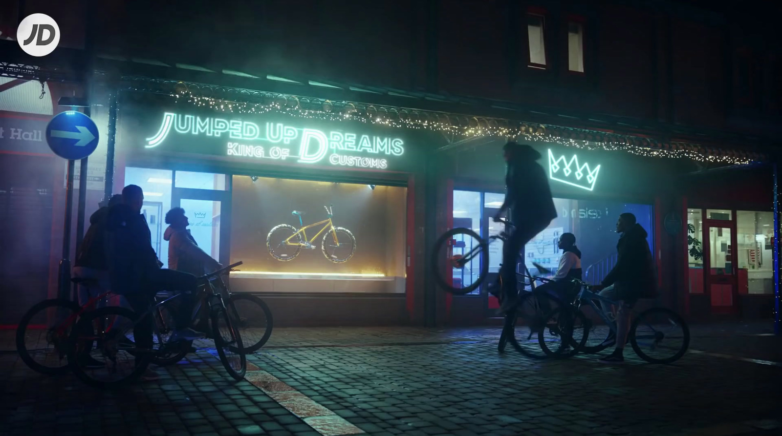 a group of people riding bikes in front of a store