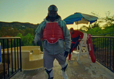 a man in a life jacket standing on a deck